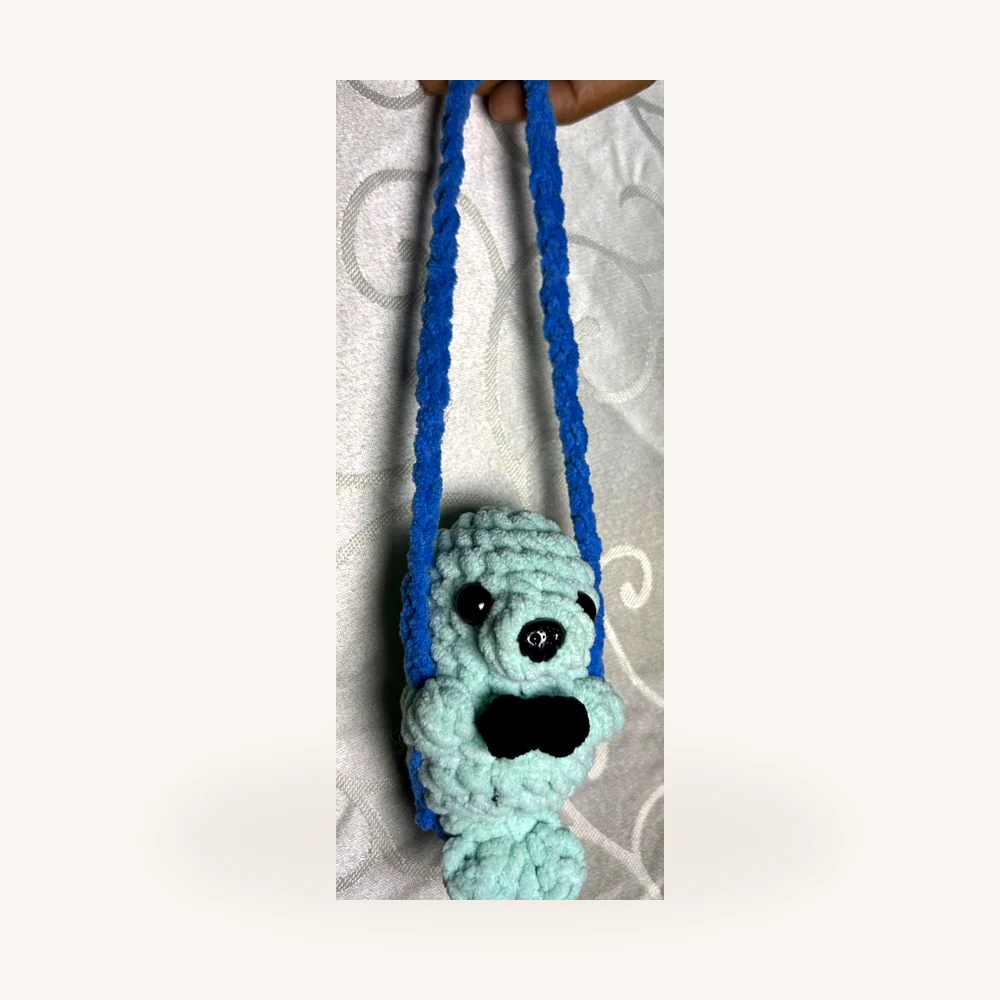 Colgante buhito celeste tejido